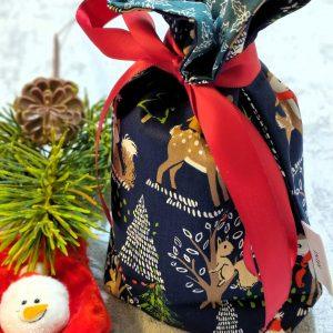 Waldgeflüster, Weihnachtsmotiv mit Waldtieren in blau und innen grüne Blätter