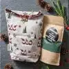 Geschenkset bestehend aus einem Beutel mit Kerzensand als Geschenk