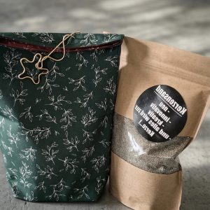 Geschenkset bestehend aus einem Beutel mit Kerzensand als Geschenk